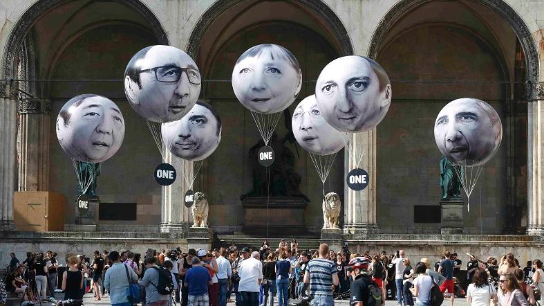 Balloons made by the 'ONE' campaigning organisation depicting leaders of the countries members of the G7 are pictured in Munich, Germany, June 5, 2015. Up to 40,000 citizens marched through Munich Thursday June 4 to protest against the upcoming G-7 summit.