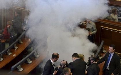 Opposition politicians release tear gas in parliament to obstruct a session in Pristina, Kosovo.