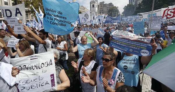 Protesters march to support striking teachers in Plaza de Mayo, Buenos Aires, Argentina.