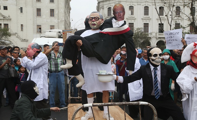 Actors during a march against Peru's President Pedro Pablo Kuczynski's pardon for Fujimori in Lima.