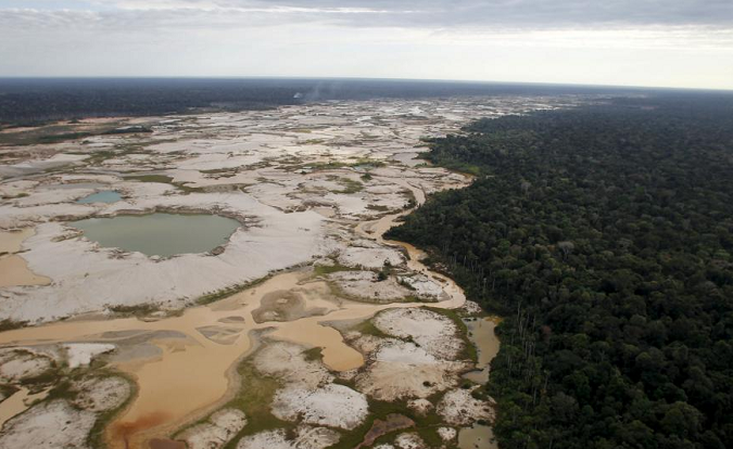 An area deforested by illegal gold mining is seen in a zone known as Mega 14, in the southern Amazon region of Madre de Dios, Peru, July 13, 2015.