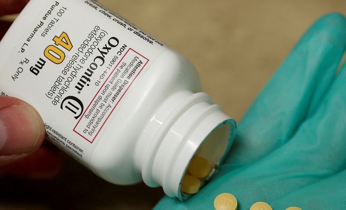A pharmacist holds prescription painkiller OxyContin, 40mg pills, made by Purdue Pharma L.D. at a local pharmacy, in Provo, Utah, U.S. on April 25, 2017.