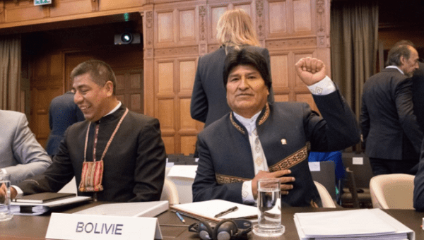 Bolivian President Evo Morales gestures as he arrives for the opening of hearings at the World Court in The Hague, Netherlands March 19, 2018.