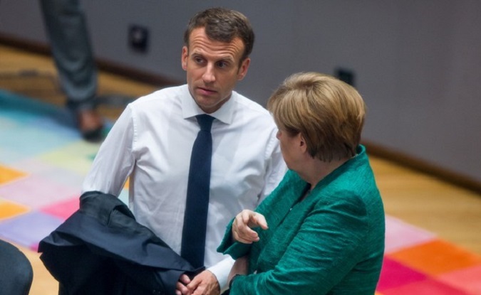 French President Emmanuel Macron and German Chancellor Angela Merkel at a European Union summit in Brussels, Belgium, June 28, 2018.