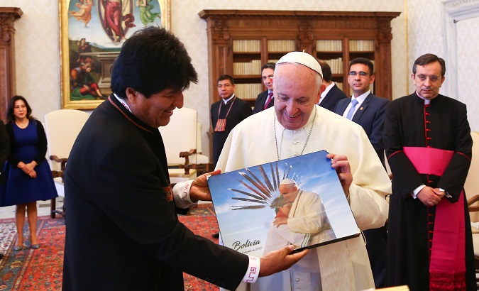 Evo Morales gave Pope Francis an image of him embracing a Bolivian child.