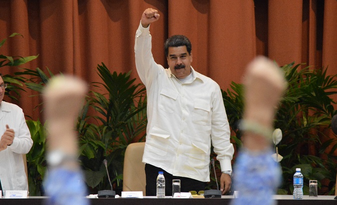 Maduro greets the crowd at the Sao Paulo Forum before his speech in Havana, Cuba.