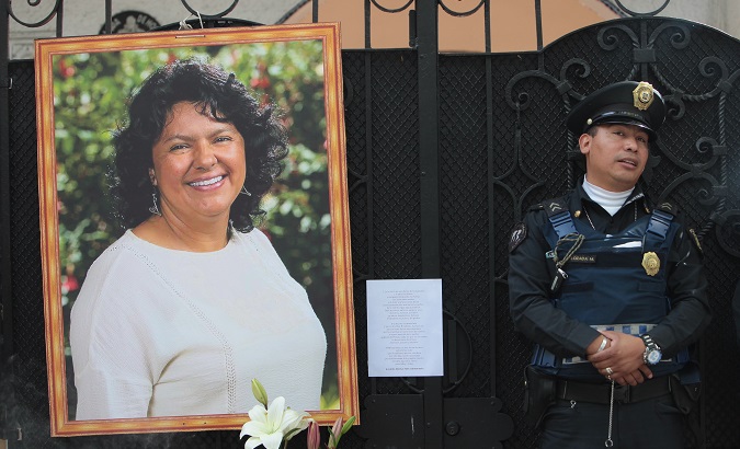 A portrait of Berta Caceres in front of the Honduran Embassy in Mexico City during a protest demanding justice, June 2016.