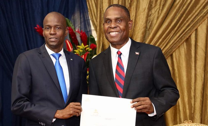 Jean Henry Ceant (R), two-time presidential candidate and leader of the Renmen Ayiti (Love Haiti) political party.