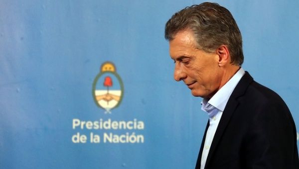 Argentina's President Mauricio Macri leaves afteer a news conference at the Olivos Presidential Residence in Buenos Aires, Argentina, July 18, 2018.