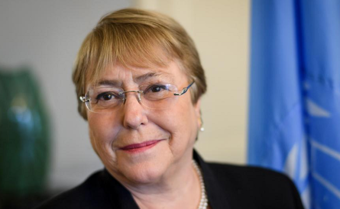 Former Chilean president Michelle Bachelet poses in her office at the Palais Wilson on her first day as new United Nations (UN) High Commissioner for Human Rights in Geneva, Switzerland, September 3, 2018.