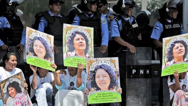 Human rights activists take part in a protest to claim justice after the murder Berta Caceres, Tegucigalpa, March 17, 2016.