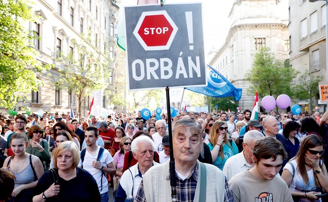 People attend a protest against the government of Prime Minister Viktor Orban in Budapest, Hungary, April 21, 2018.