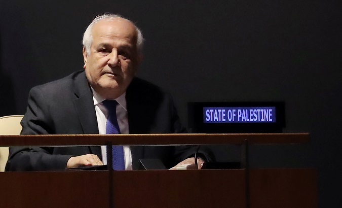 Palestinian U.N. Ambassador Riyad Mansour sits while members of the General Assembly vote on allowing Palestine to act like a member state in 2019 meetings.