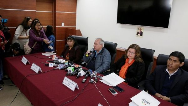 Members of the Supreme Electoral Tribunal attend a news conference after the resignation of the tribunal's president Katia Uriona in La Paz, Bolivia.