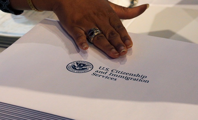 Information packs are distributed by the U.S. Citizenship and Immigration Services following a citizenship ceremony.