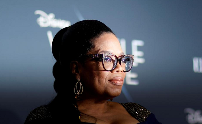 Cast member Oprah Winfrey poses at the premiere of 