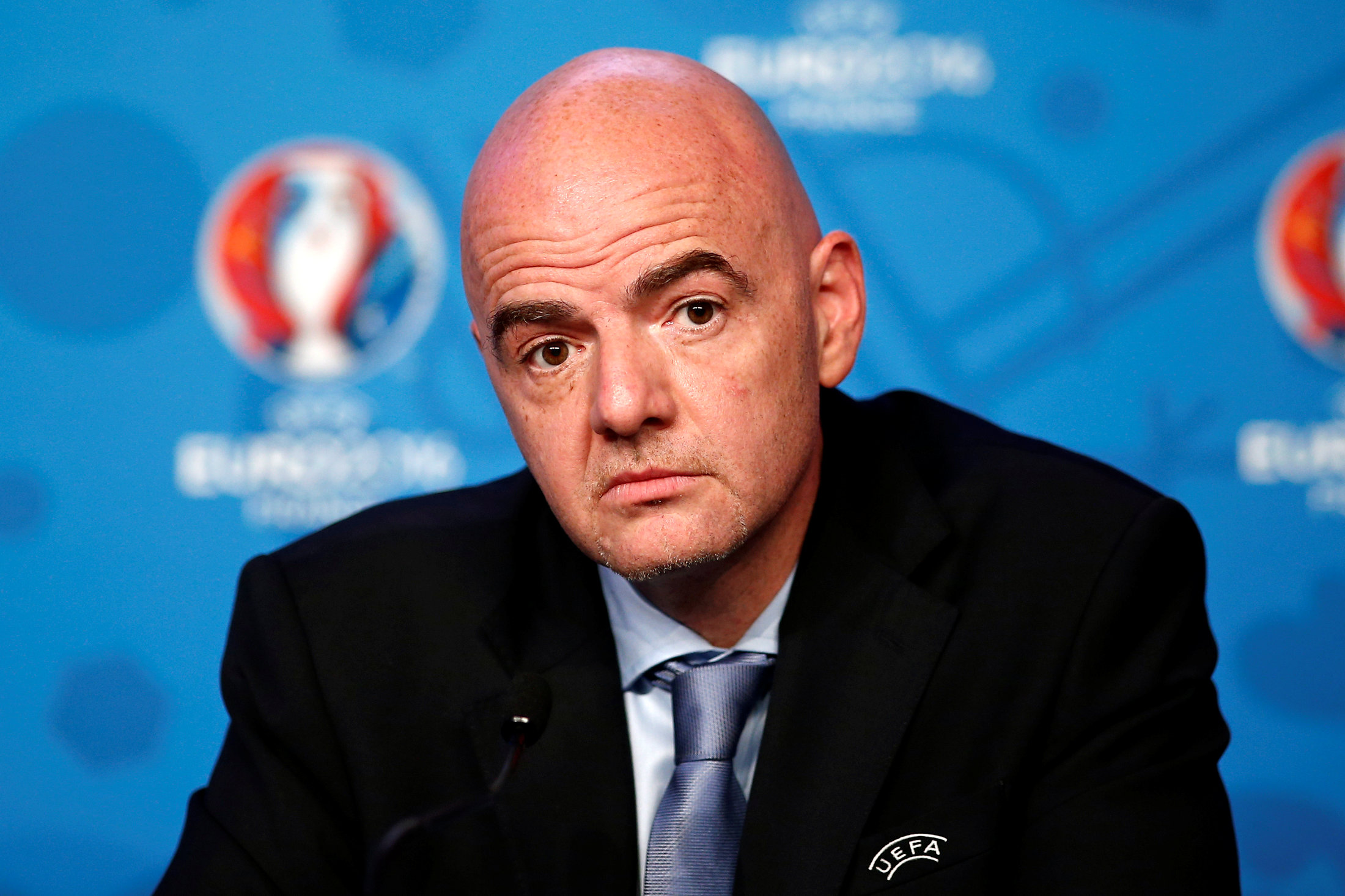UEFA General Secretary Gianni Infantino attends a news conference after a meeting of UEFA's executive committee, on the eve of the draw of the Euro 2016 finals in Paris.