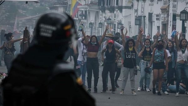 Colombia's anti-riot police charged against protesters across the country.