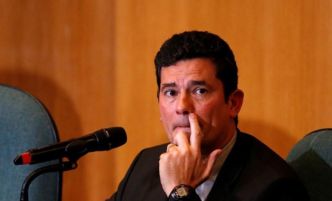 Minister of Justice Sergio Moro said, “Possession means that the person can have a weapon inside the house, not that he walks around with the gun.