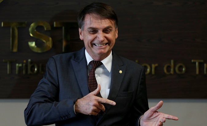 Brazil's President-elect Jair Bolsonaro gestures during a meeting at Superior Labor Court in Brasilia, Brazil, Nov. 13.
