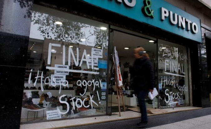 A store goes out of business in Buenos Aires, Argentina May 17, 2018. The country's 2019 budget that proposes heavy social spending cuts, goes to the Senate