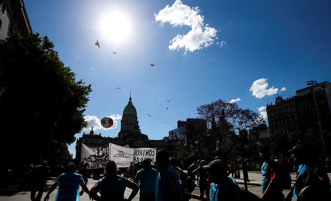 Demonstrators protest against the budget bill outside the Congress in Buenos Aires, Argentina, November 14, 2018.