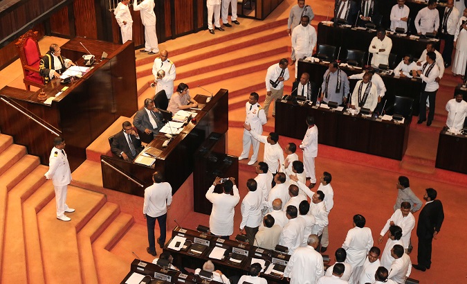 Sri Lanka's Parliament members erupt into arguments Wednesday.