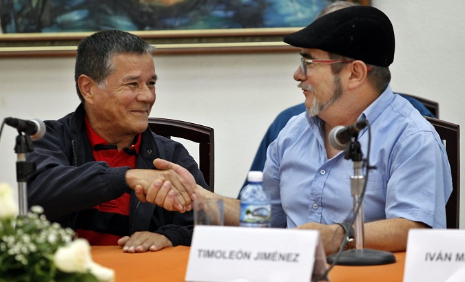 Former FARC commander Rodrigo Londoño (R) and ELN leader Nicolas Rodriguez (L) at a press conference in Havana on May 11, 2017. Cuba.