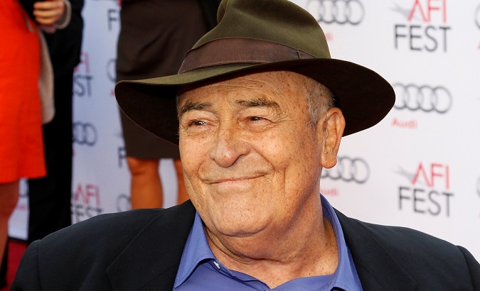Bertolucci is interviewed as he arrives for a gala screening of 