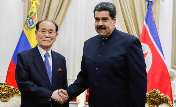 President of the Parliament of the Democratic People's Republic of Korea, Kim Yong Nam (l) and Venezuelan President Nicolas Maduro.