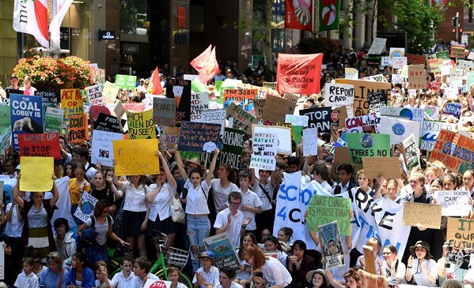 Thousands of students gathered to demand actions to mitigate climate change in Sydney on Australia, Nov. 30, 2018.