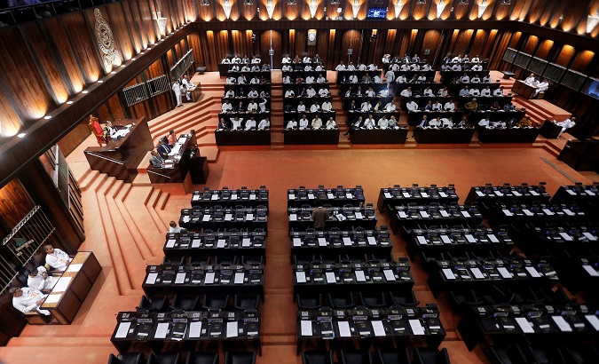 Empty seats of parliament members who back newly appointed Prime Minister Mahinda Rajapaksa.