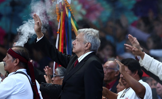 Mexico's President Andres Manuel Lopez Obrador takes part in an indigenous ceremony during the AMLO Fest at Zocalo square in Mexico City, Mexico December 1, 2018. Picture taken December 1, 2018.