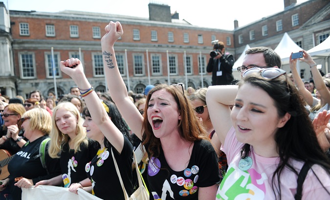 Irish women celebrate May referendum.