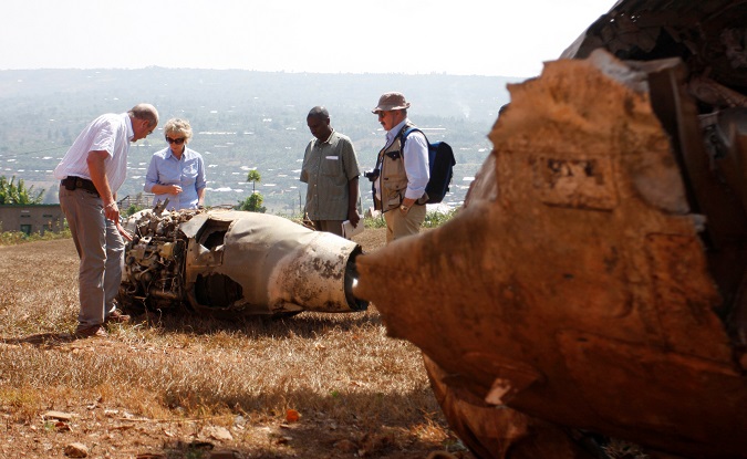 French investigators examine the wreckage of Juvenal Habyarimana's Dassault Falcon 50 plane, September 18, 2010.