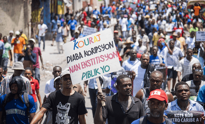 Haitians protest corruption in September 2018. 