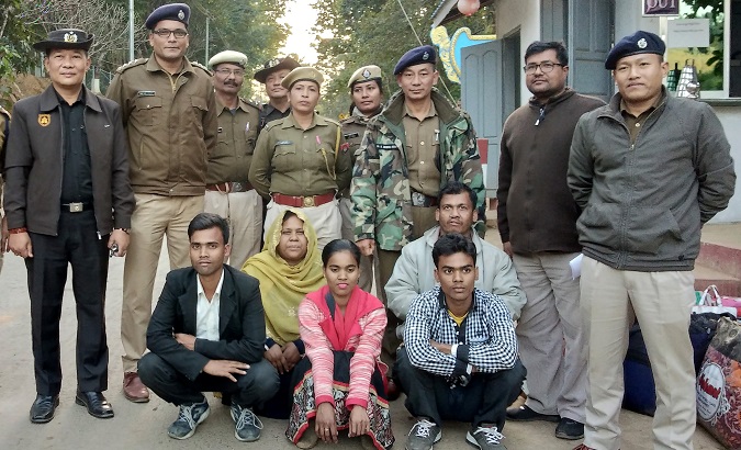 The about-to-be-deported Rohingya family with Indian and Myanmar security officials before deportation on India-Myanmar border, India, Jan 3, 2019.