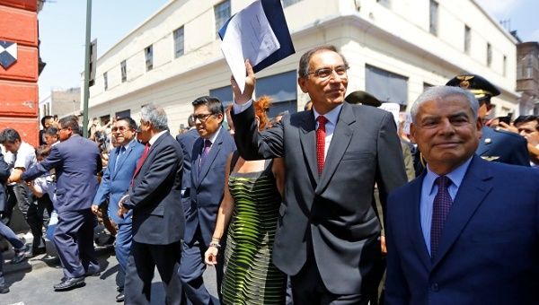 Peru's President Martin Vizcarra leaves the Congress to declare the public prosecutor's office in a state of emergency, in Lima, Peru Jan. 2, 2019