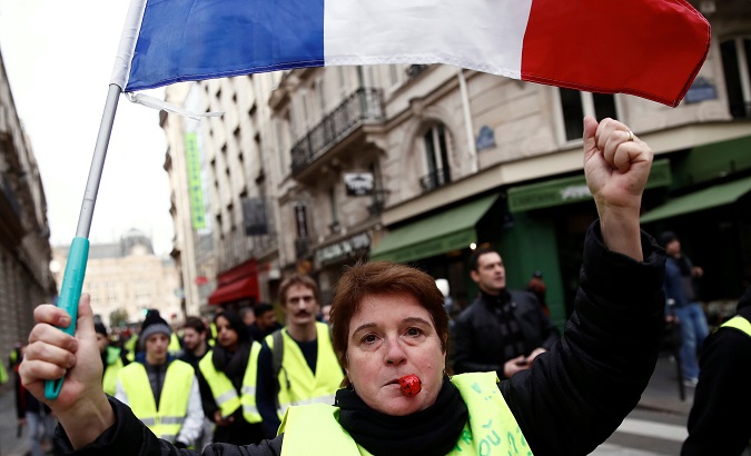 Yellow vests protest in central Paris, France, Dec. 22, 2018.
