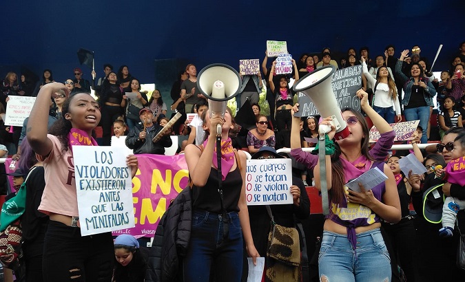 Activists in Ecuador protesting against rape, femicide, and xenophobia.