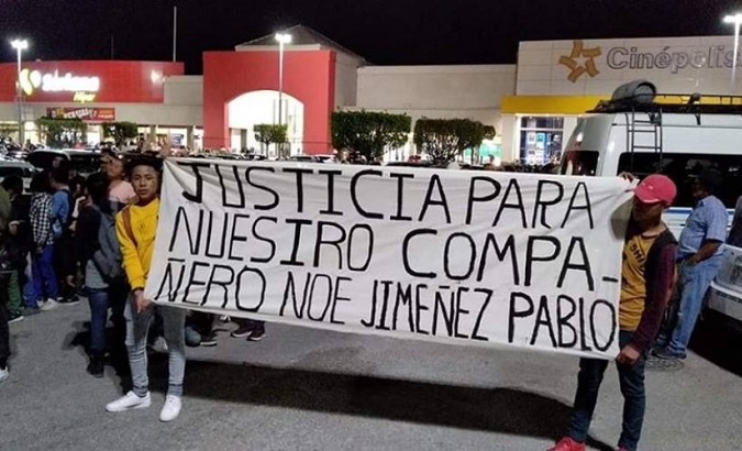 Protesters from the Movimiento Campesino Veracruzan demonstrated against the murder of the social leader, holding a sign with the words, 