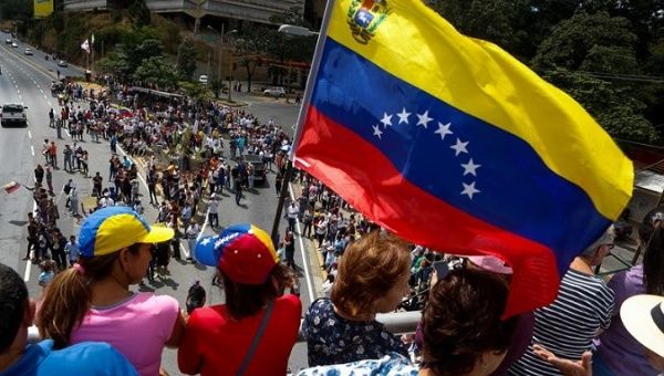 Protesters stood outside the Panamanian Foreign Ministry in Caracas rejecting the country’s decision to support foreign intervention.
