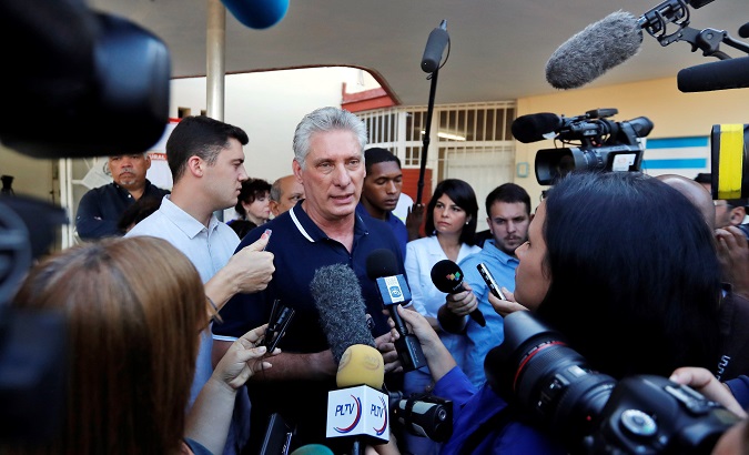 President of Cuba Miguel Diaz-Canel makes a statement Sunday as he arrives to a school to cast his vote on the new Cuban constitution, Havana (Cuba)