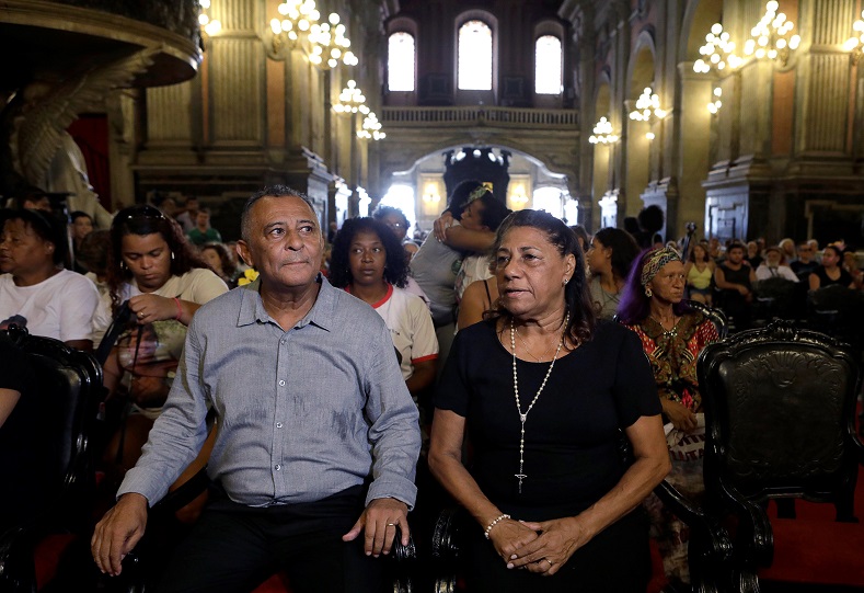 Marinete da Silva and Antonio da Silva, parents of late activist and councilwoman Marielle Franco, attend a mass marking the the first anniversary of Franco's murder in Rio de Janeiro.