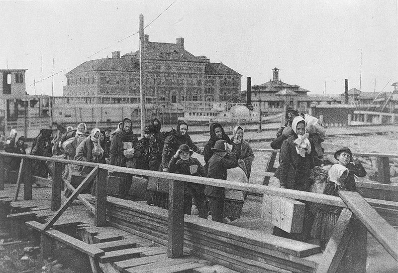 Migrants in line to enter Ellis Island. Millions of Europeans migrated to the U.S. at the start of the 20th century.