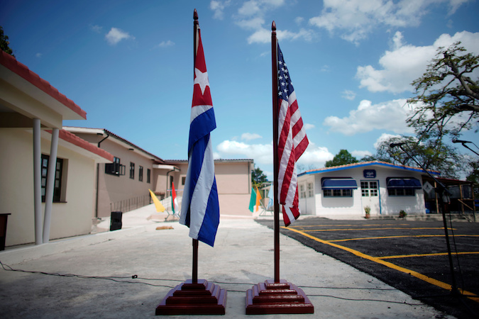 U.S. and Cuban flags are displayed at the Ernest Hemingway Museum during an event in Havana, Cuba, March 30, 2019.