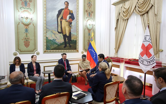 Venezuela's President Nicolas Maduro and Peter Maurer, president of the International Committee of the Red Cross (ICRC), talk during their meeting at Miraflores Palace in Caracas, Venezuela April 9, 2019.