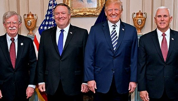 (Left to right) National Security Advisor John Bolton, Secretary of State Mike Pompeo, President Donald Trump and Vice-President Mike Pence have been upping the pressure on the Venezuelan government.