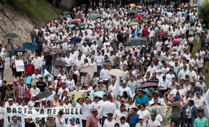 Honduran doctors and teachers continue their demonstrations against the government.