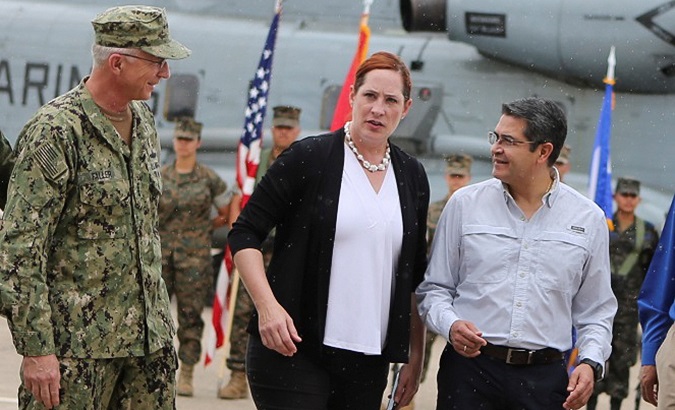 US Southern Command head Craig Faller (L), US Businesses charge Heide Fulton (C), President Juan Orlando Hernandez (R) in Tegucigalpa, Honduras, June 21, 2019.